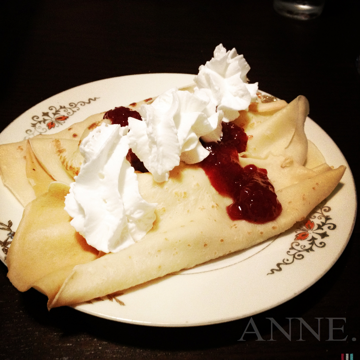 Topped with lingenberries and whipped cream